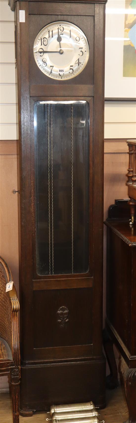 A 1920s oak cased eight day striking and chiming longcase clock H.214cm